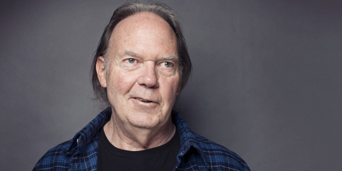 FILE - This Sept. 27, 2012 file photo shows singer-songwriter Neil Young posing for a portrait at The Carlyle hotel in New York. Young has raised more than $6 million through a Kickstarter campaign to fund his digital music project PonoMusic. Kickstarter closed the campaign Tuesday after raising 6.2 million through 18,000 supporters. The campaign is the third most funded project for Kickstarter. (Photo by Victoria Will/Invision/AP, file)