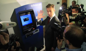 Robocoin CEO Jordan Kelley at a Bitcoin ATM